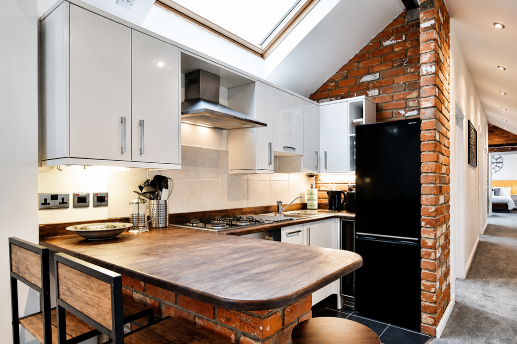 Full kitchen with fridge/freezer Full kitchen with fridge/freezer