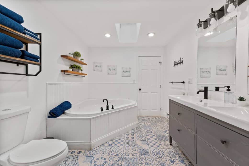 Huge 1st floor bathroom with Jacuzzi tub, separate shower, double sinks 