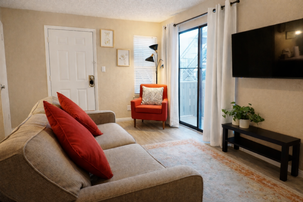 Comfortable living area featuring a Smart TV for effortless streaming and entertainment