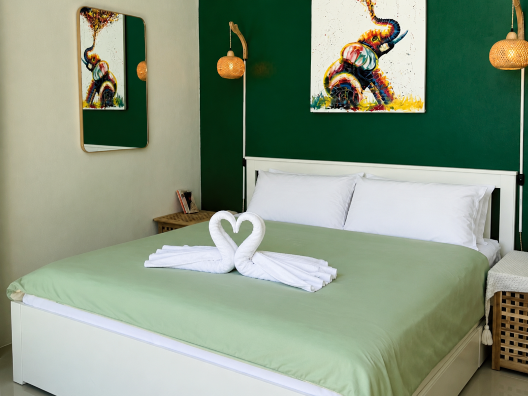 Escape to the master bedroom, where you can watch the sunrise over the pool Escape to the master bedroom, where you can watch the sunrise over the pool