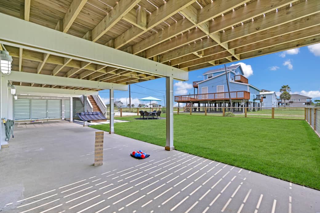 Covered area for Jenga or enjoy a game of bocce in the yard.