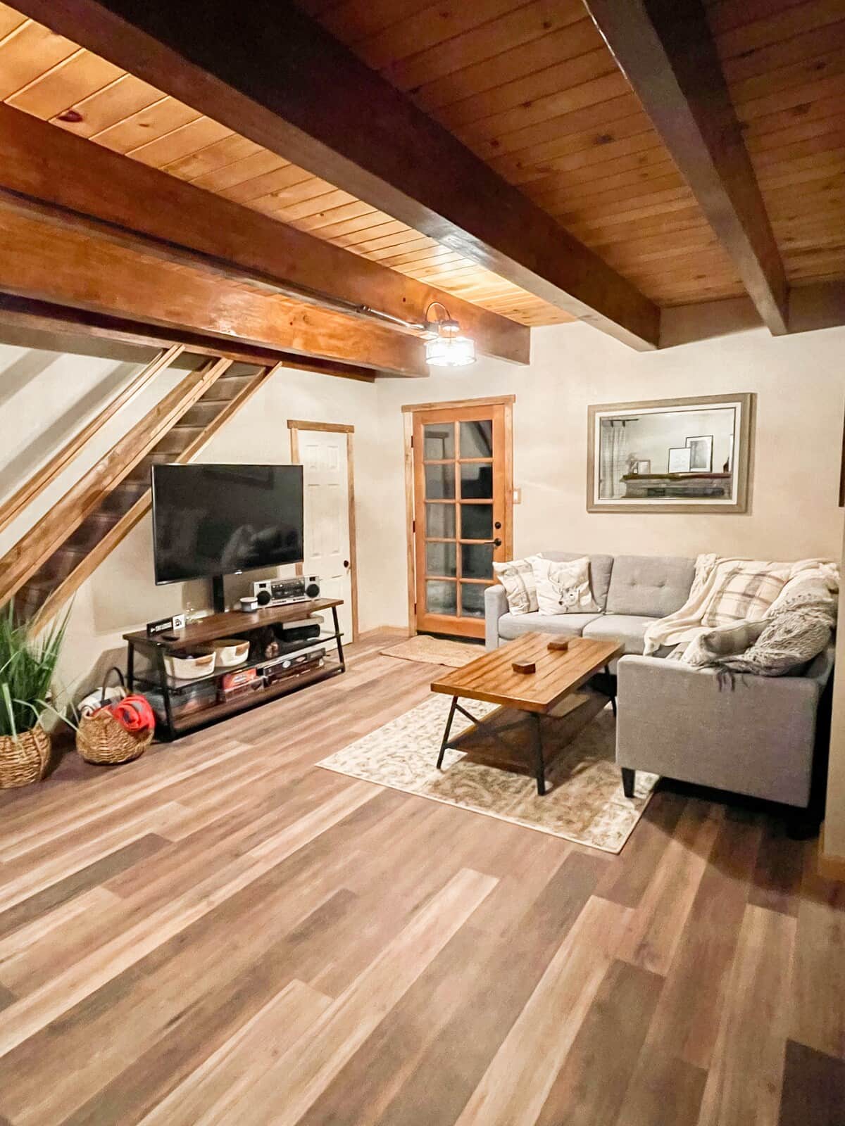 Downstairs living room with Smart TV (Roku), games, and puzzles.