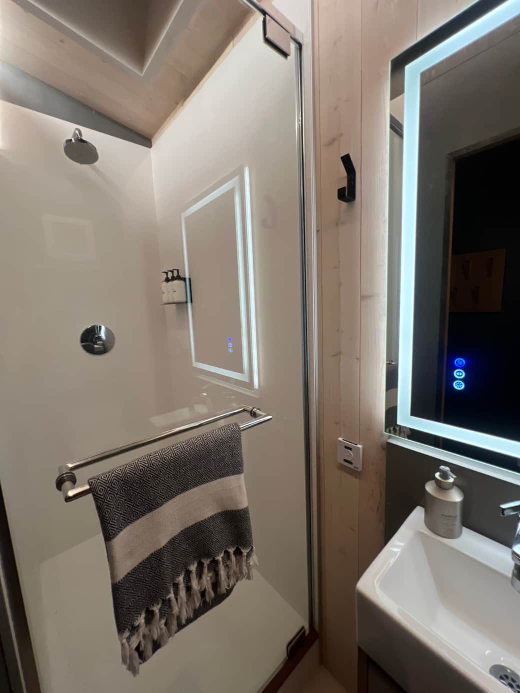 Spacious, luxurious, hot shower with Public Goods products