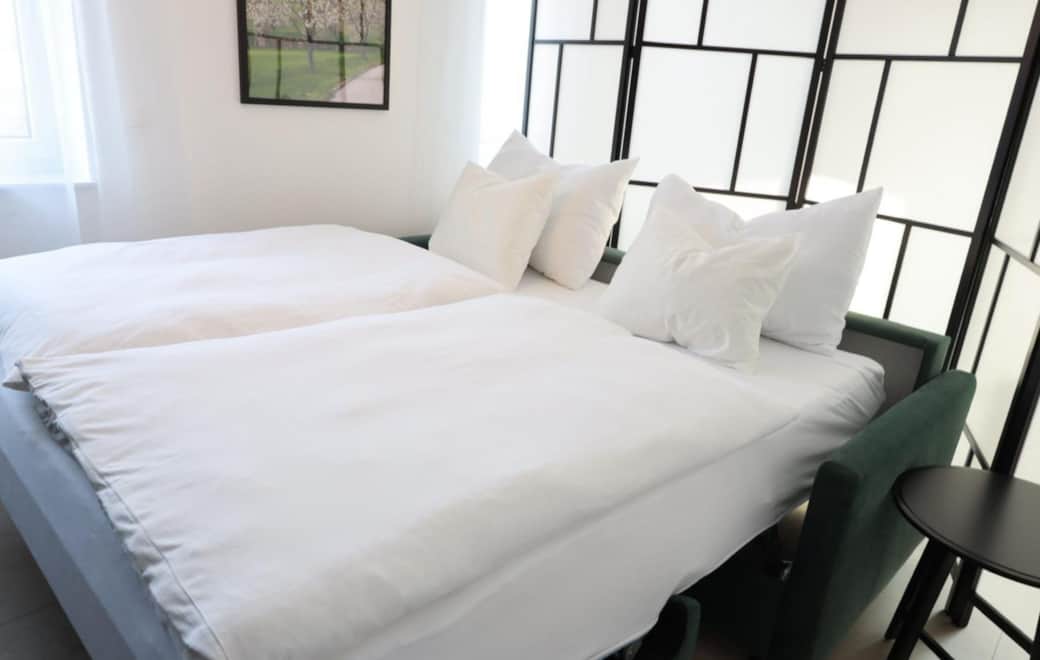 Zweites Schlafzimmer grünes Apartment