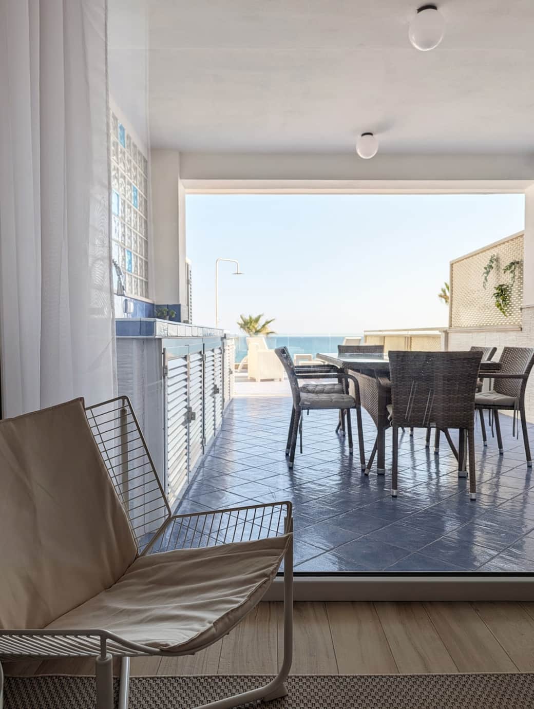 Outdoor dining area with sea views