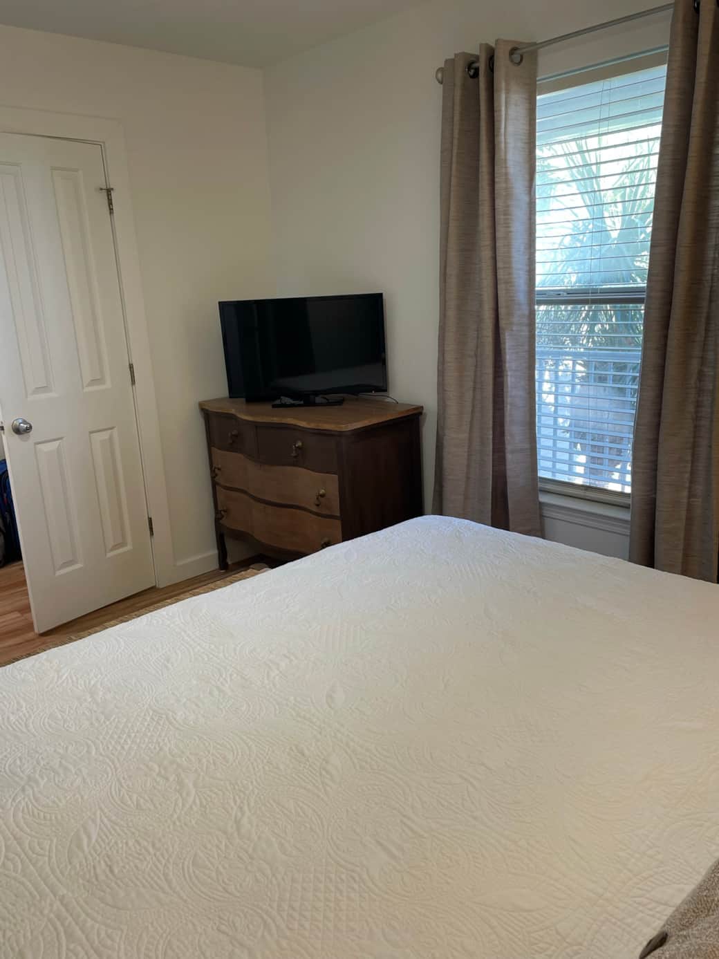 Dresser and TV in primary room