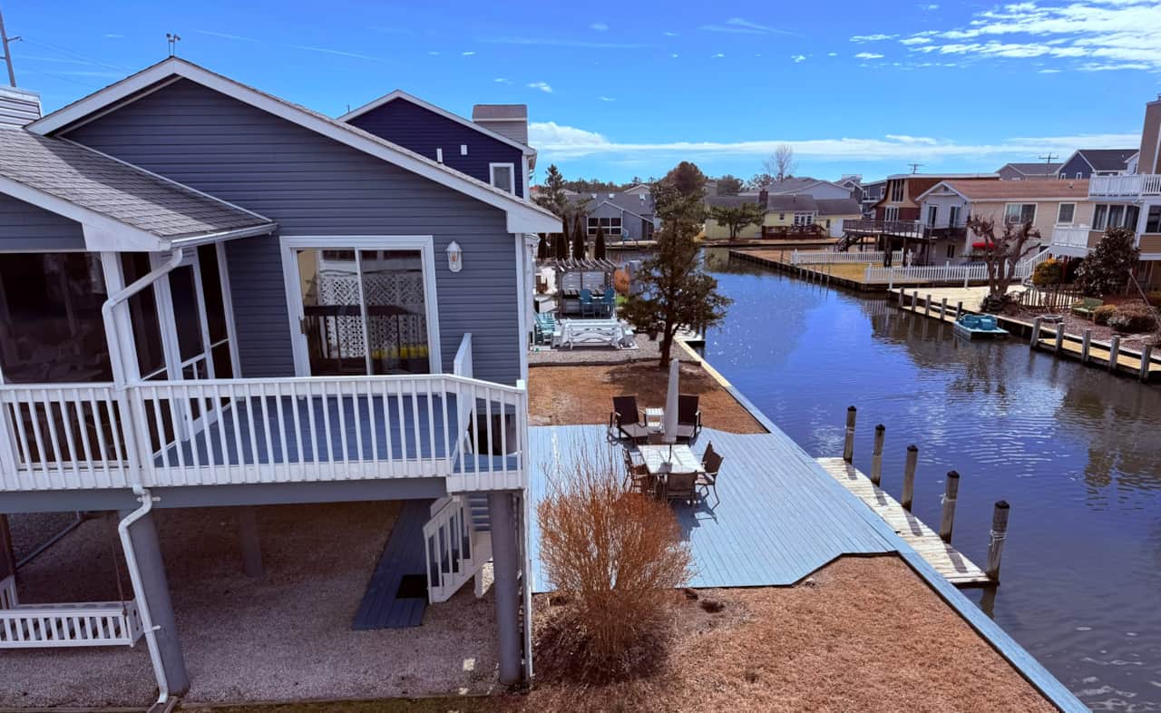 Deck, dock, 2nd fl deck, screened porch, water views, grill, table, bring or rent kayaks or boats.