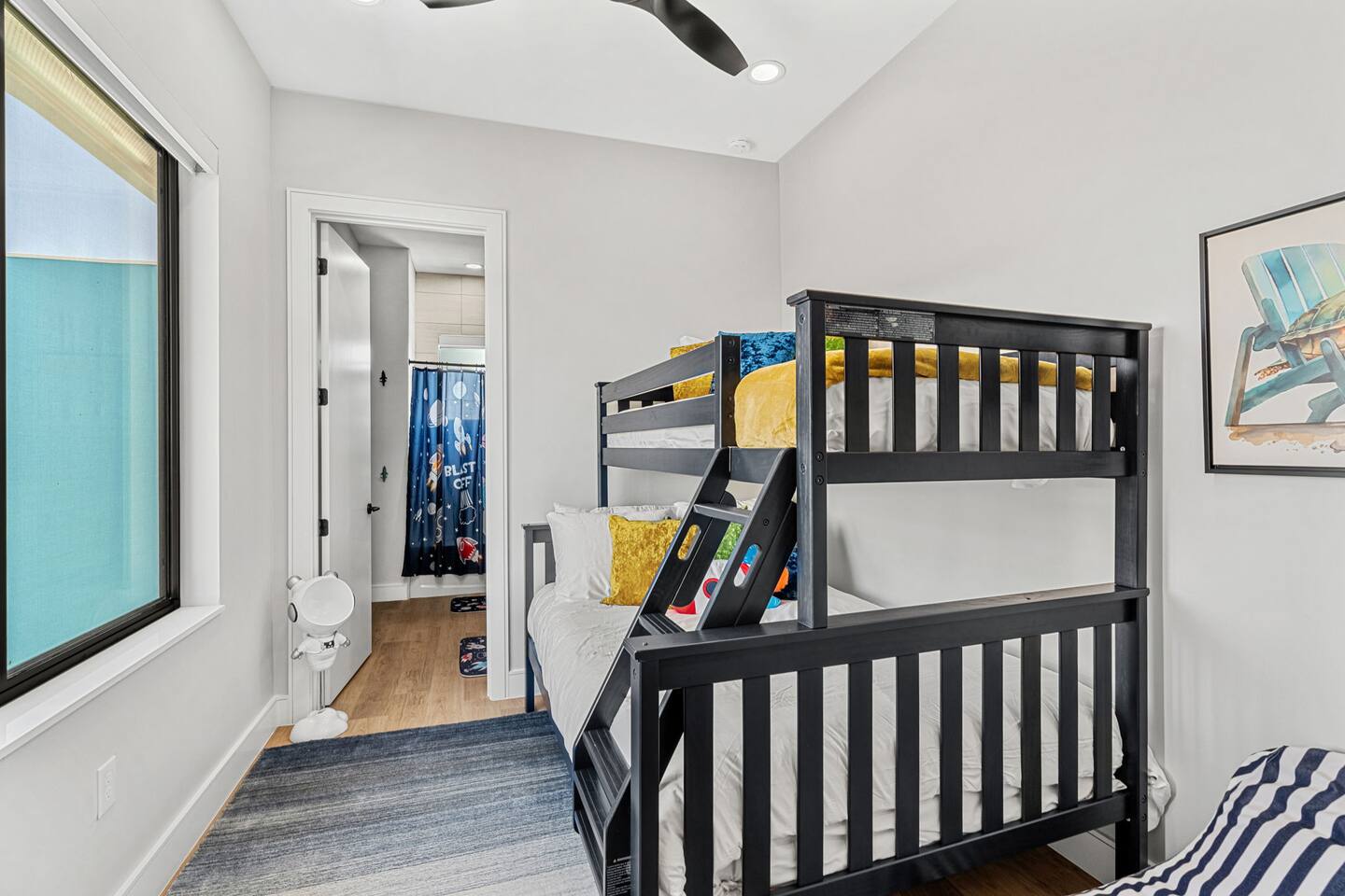 Fun and functional, this room offers cozy bunk beds for the little ones.