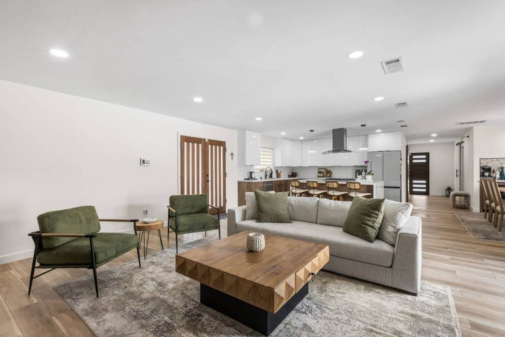 Relax in comfort while enjoying a seamless flow to the dining and kitchen areas.