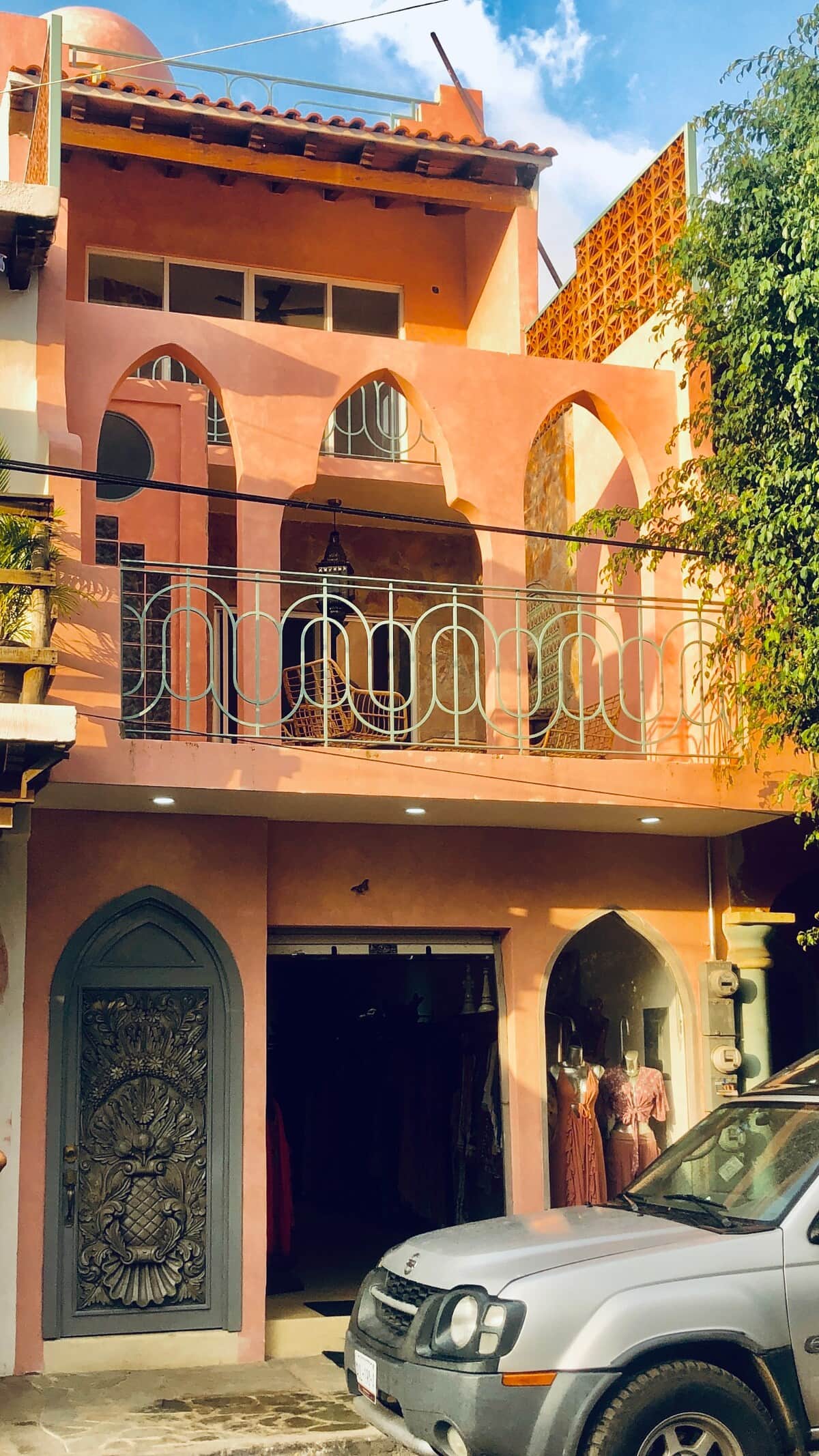 Building from the street.  You enter the apartments thru the beautifully carved door.  Our shop is open below from 9 am to 9 pm.  