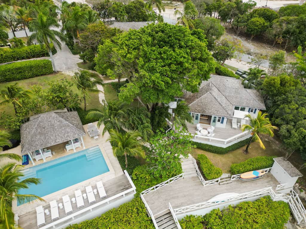 Aerial view of Low Tide Cottage pool, deck, and luxury cottage at Harbour View Cottages.