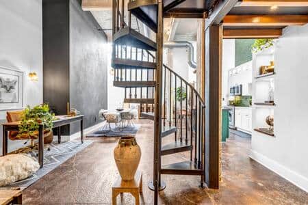 Staircase to loft bedroom with Cloud king bed
