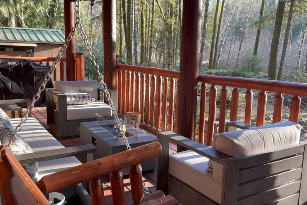 Back Deck with outdoor seating, swing and a gas fire pit 