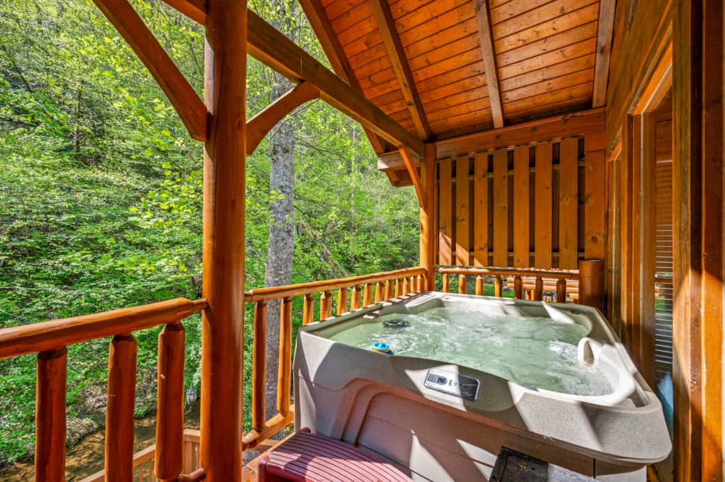 Hot tub bliss with creekside views—nature’s perfect relaxation spot