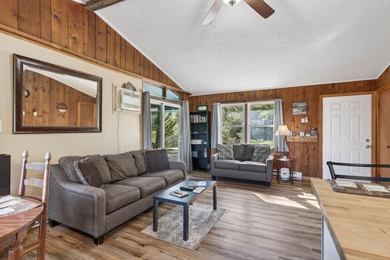 Relax in the spacious living room, the perfect place to unwind after a day of exploring. 