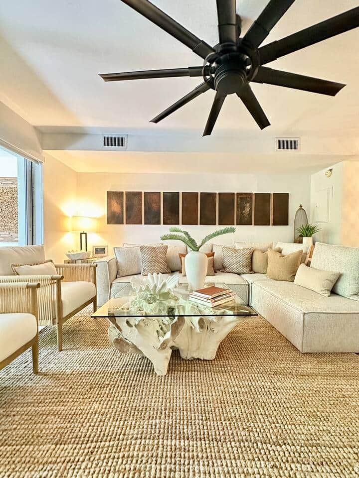 Lounge in style—this open-concept living area features designer decor, plush seating, and plenty of natural light.