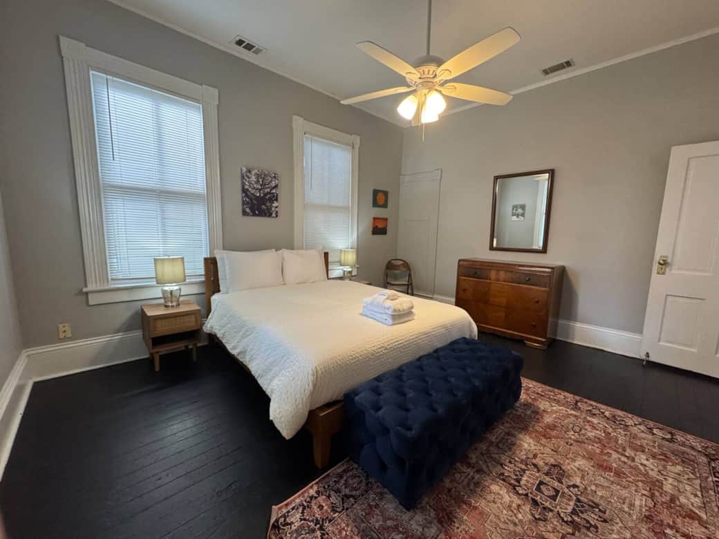 Queen bed with a ceiling fan to keep you cool, plus extra storage available in the dresser drawers and closet.