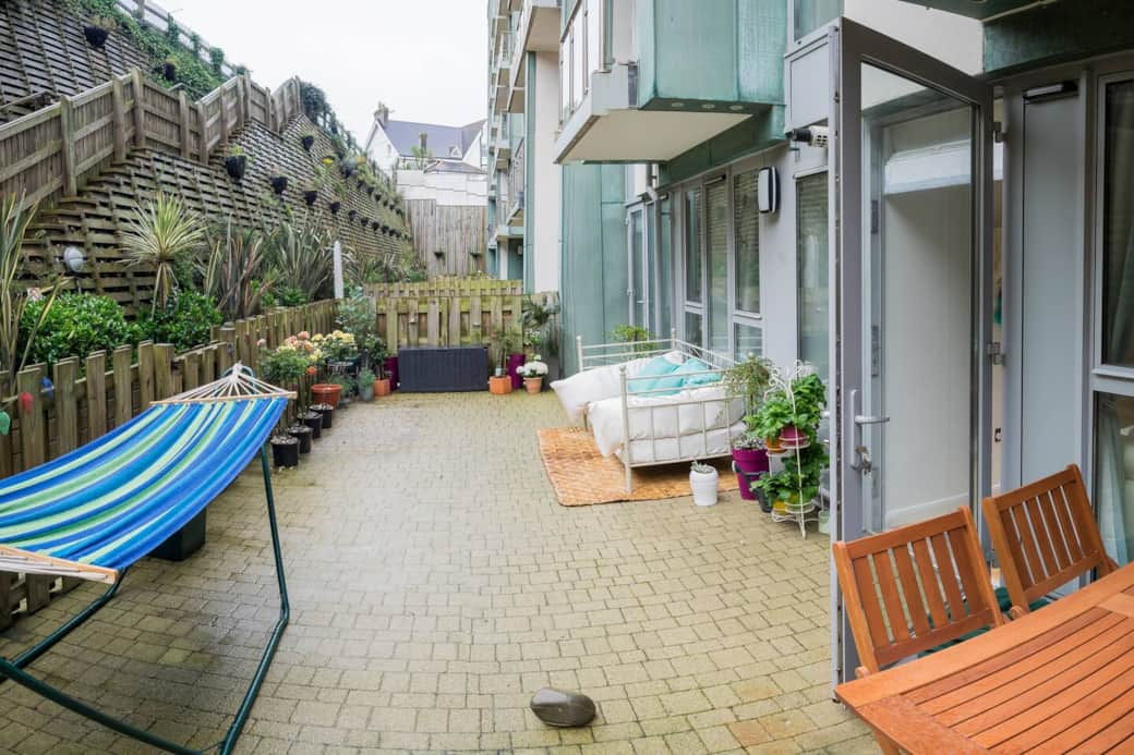 Large private outdoor patio (when you arrive furniture will be under dark green plastic covers) Hammock removed for safety reasons.