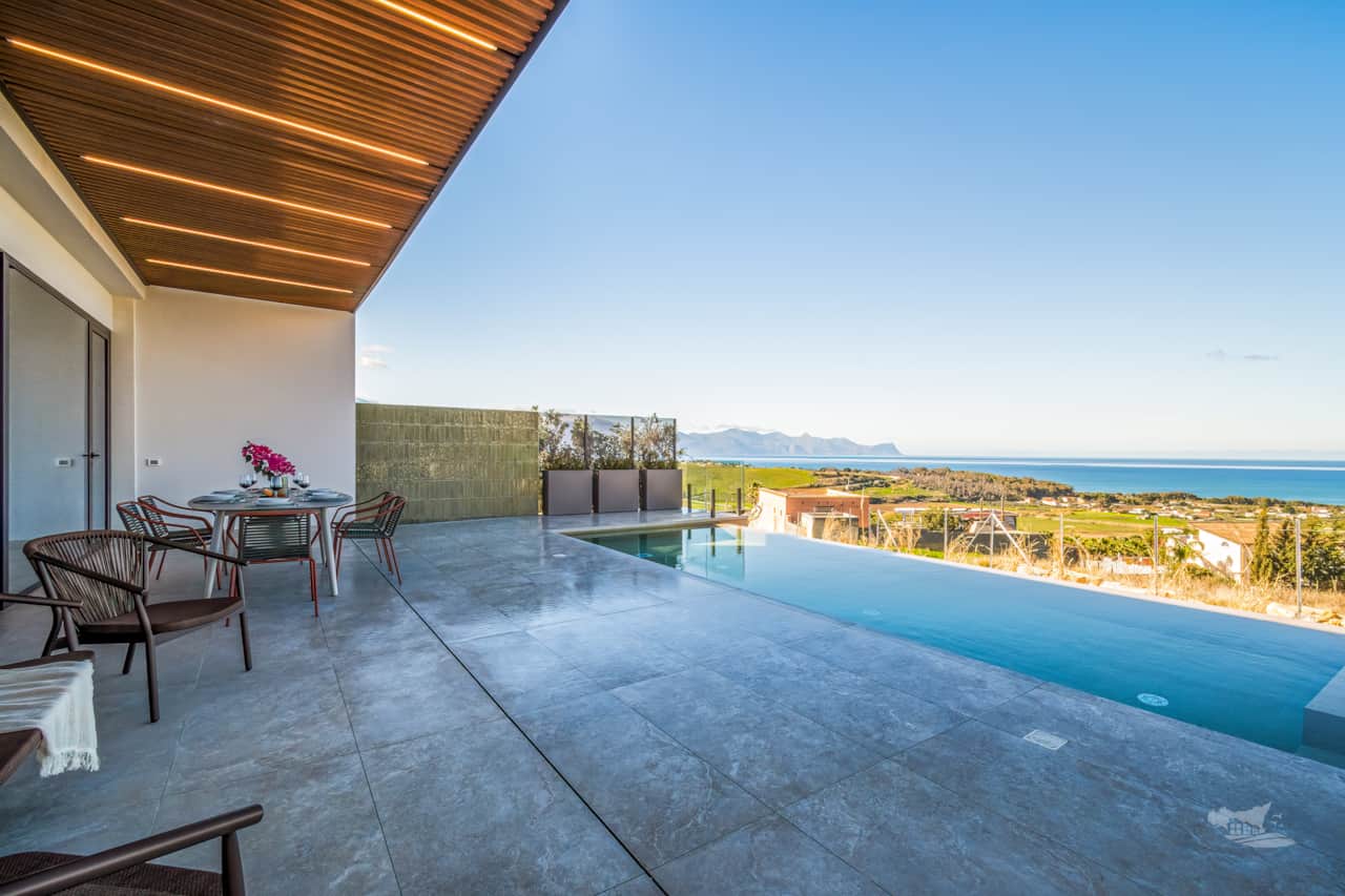 Infinity pool blending into the horizon, offering breathtaking sea views and pure relaxation.