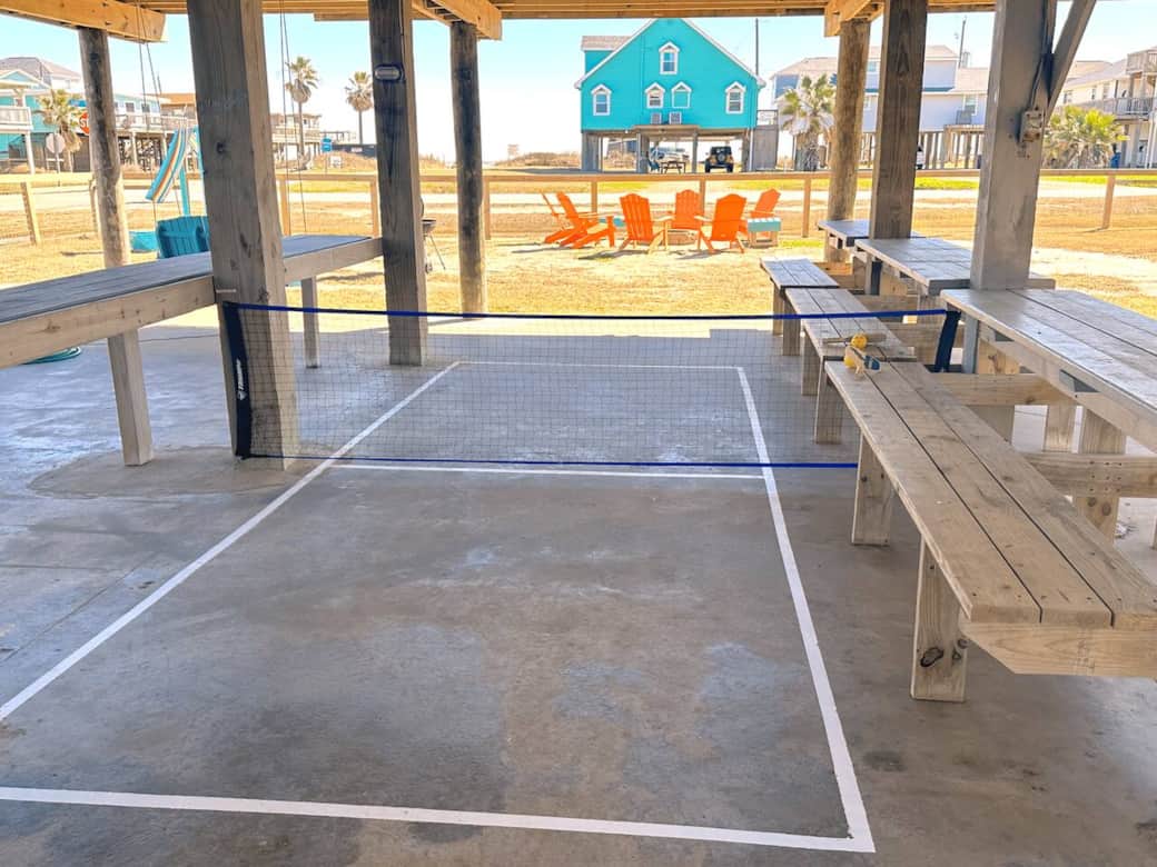 New! Seat 32 of your favorite people at our 5 downstairs picnic tables, and spread your food and drink across our super-long bar area.  Right next to the hot tub and outdoor sink and shower. Fun!