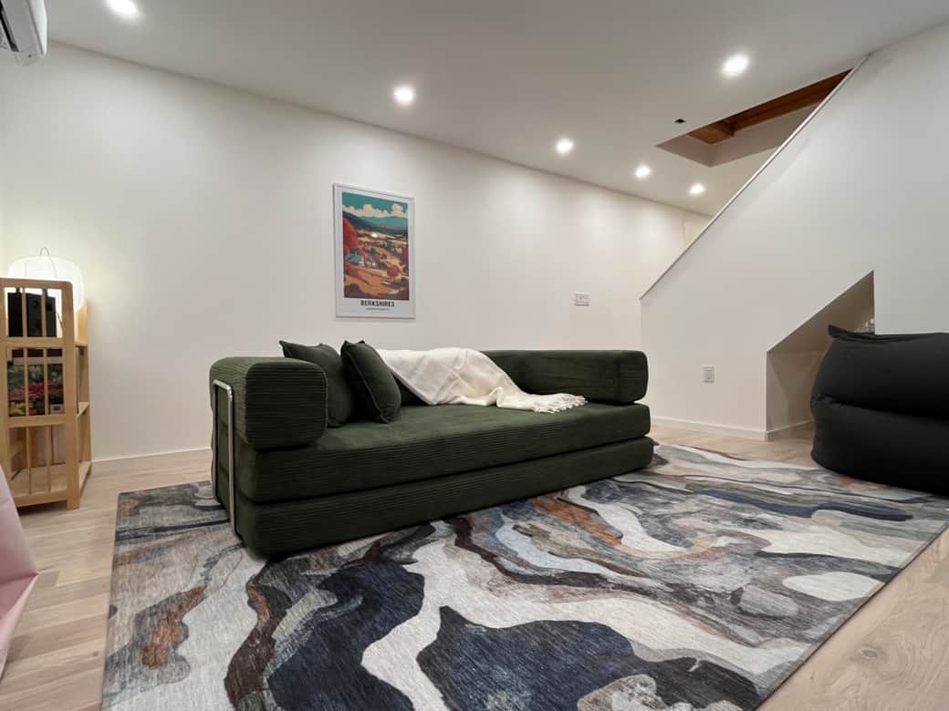 Plenty of soft seating in the TV room! Plenty of soft seating in the TV room!