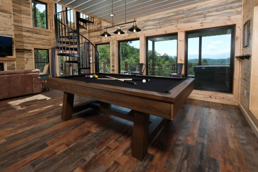 	“Spacious living room with fireplace – romantic mountain nights await”