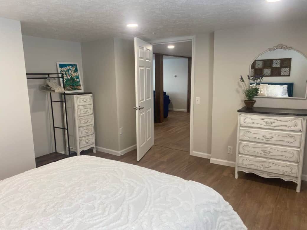 Calm and relaxing room with ample storage and Serta queen sized bed. 