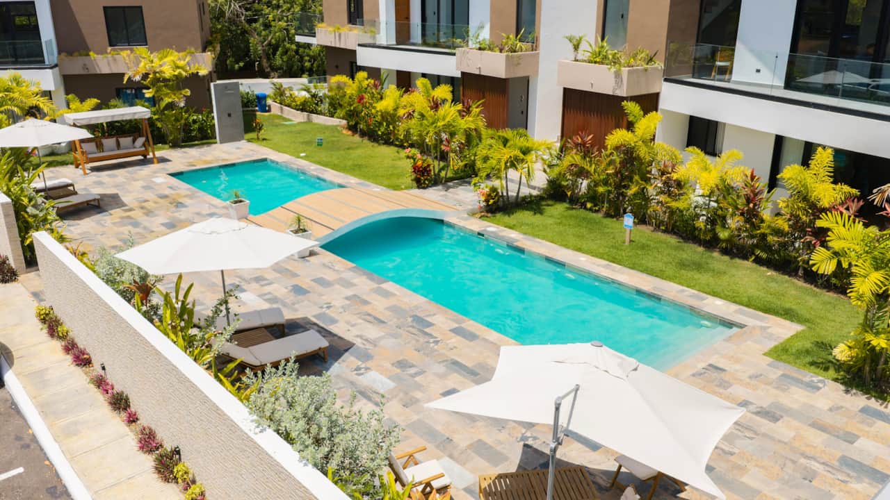 Lounge chairs & shaded seating steps from the unit |Outdoor shower for easy post-beach rinse