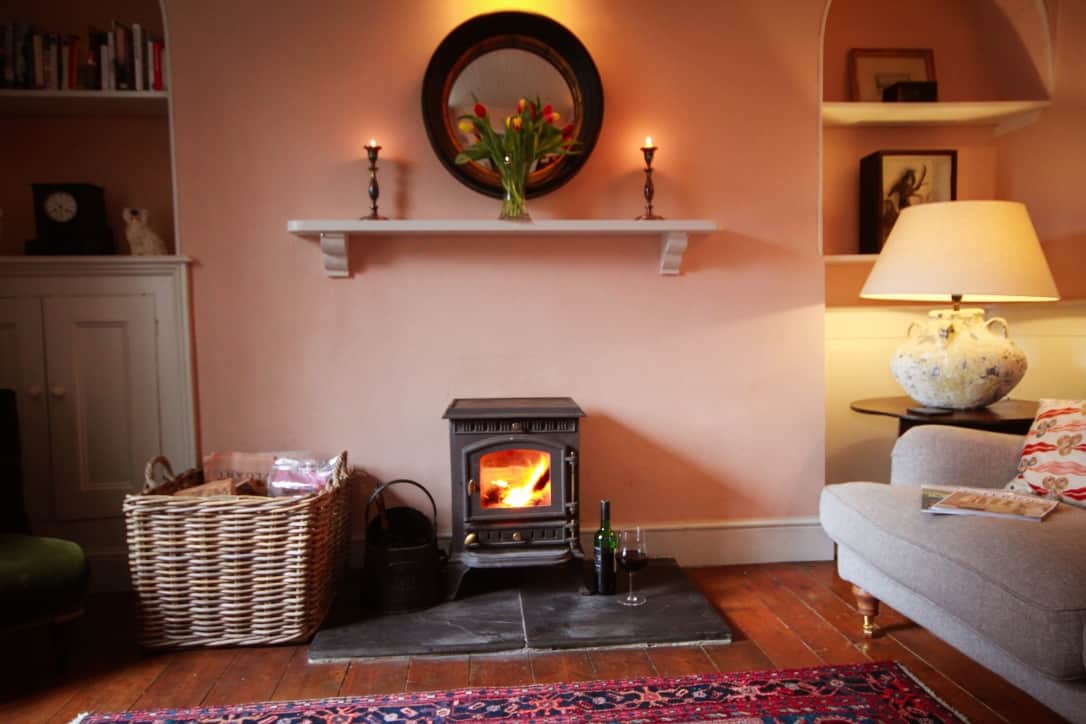 Living room with log burner -Castell Carreg