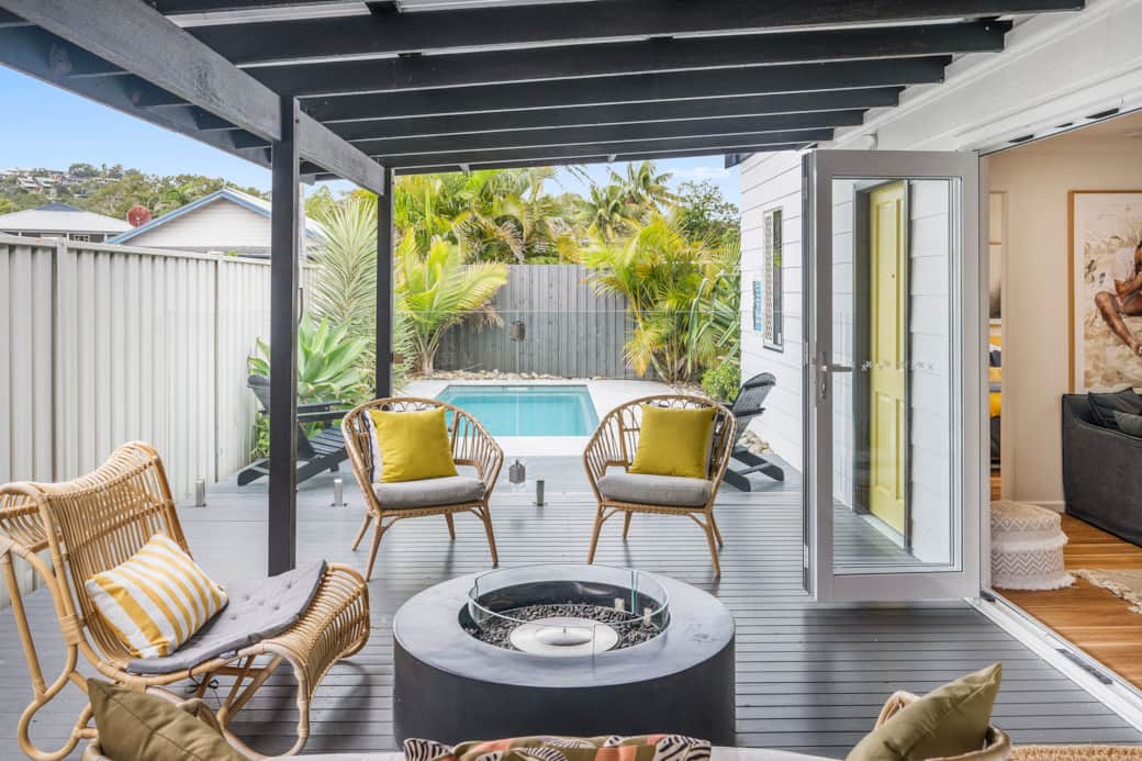 Covered entertainment area with gas fire pit