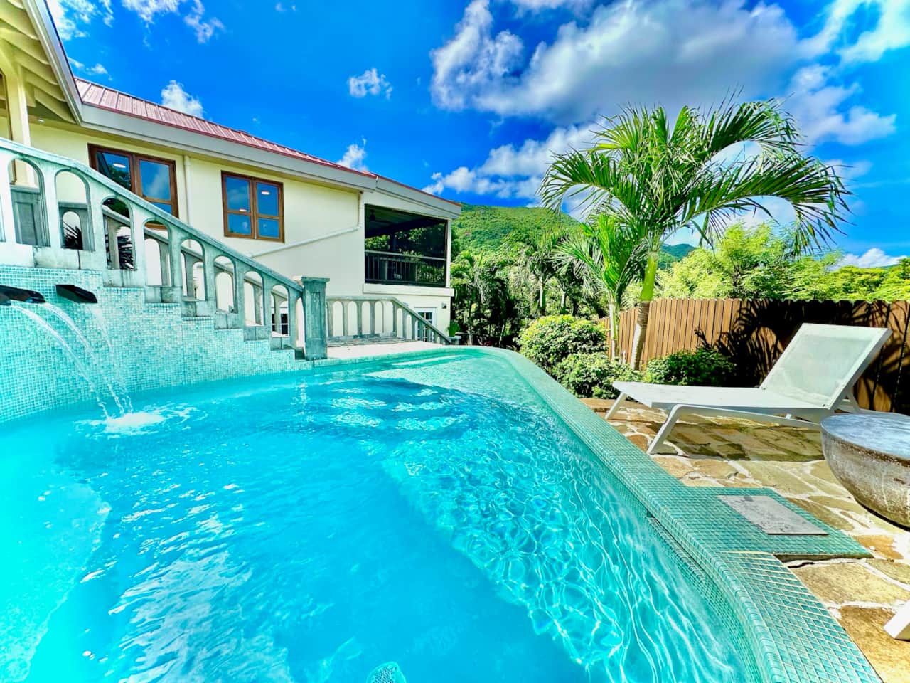 Beautiful waterfall into the pool