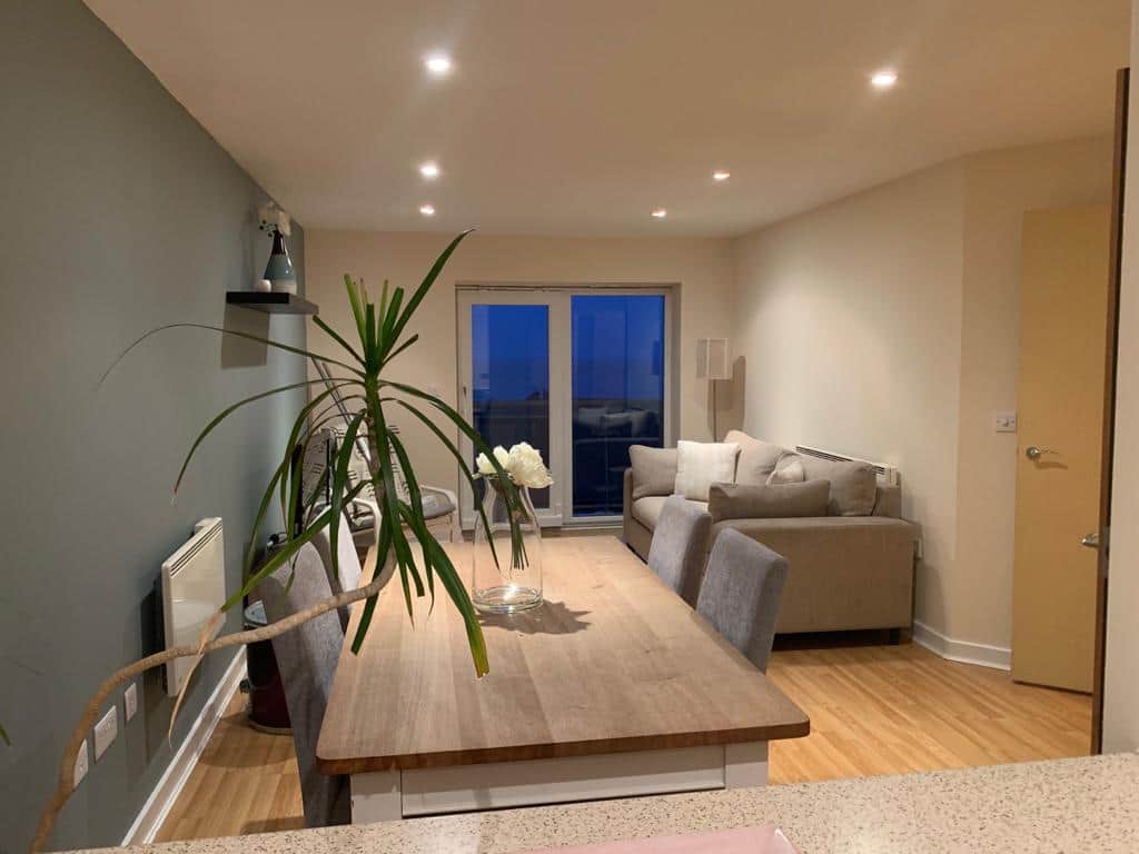 Living and dining room with balcony seaview