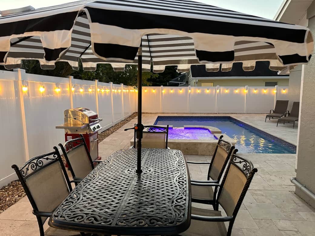 Outdoor seating for six plus two lounge chairs to enjoy the weather.