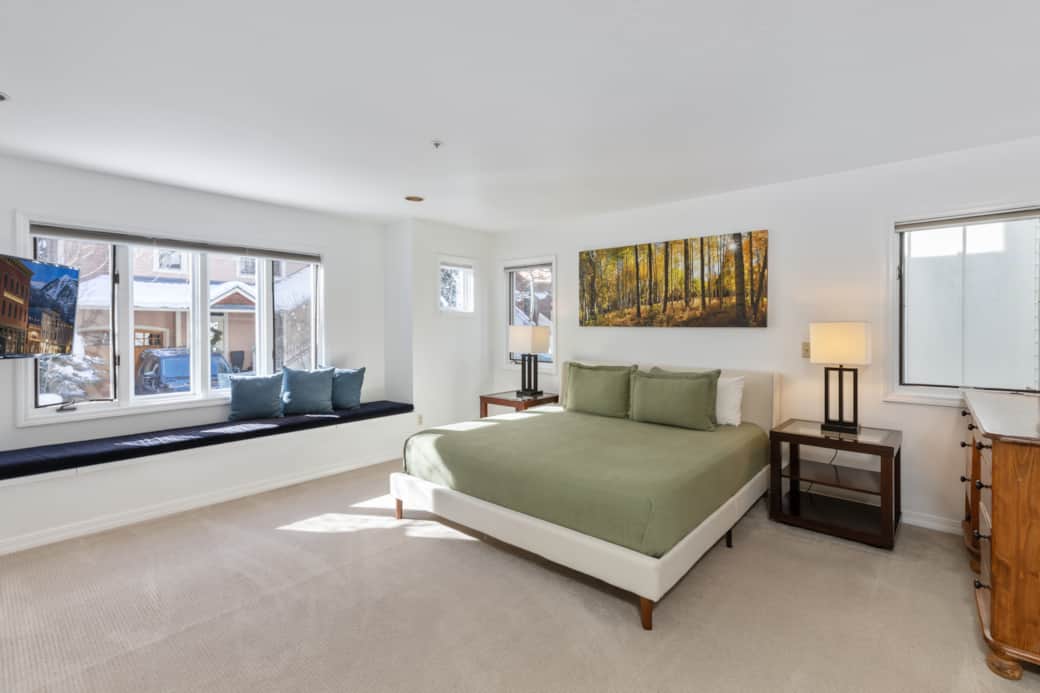 The spacious primary bedroom has a king bed, window seating and ensuite bathroom The spacious primary bedroom has a king bed, window seating and ensuite bathroom