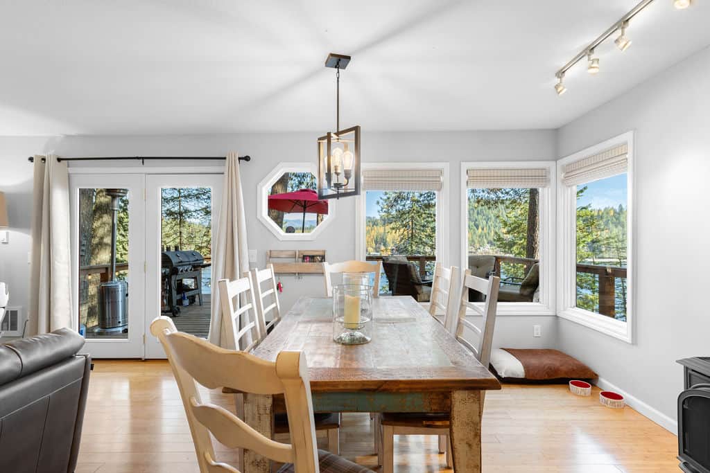 Seating for six at the dining table with incredible lake views