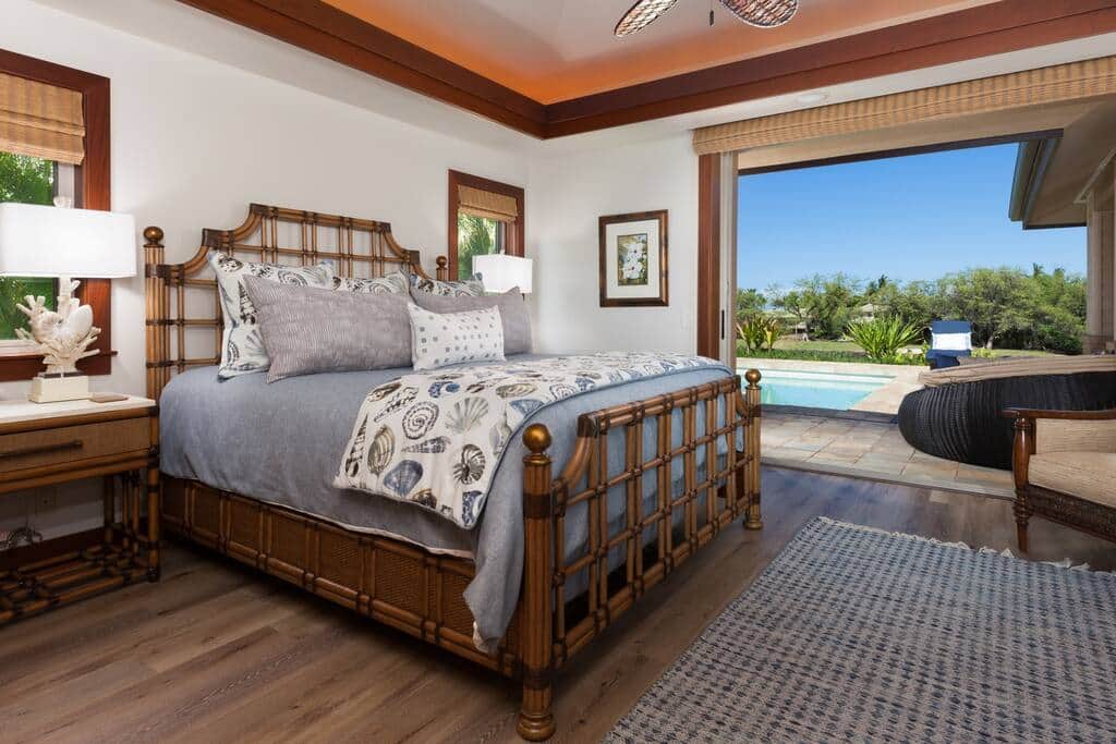 Master bedroom with poolside views