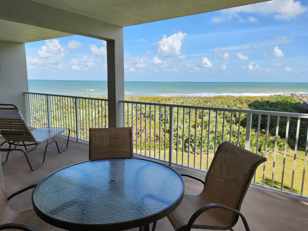 View of balcony and ocean