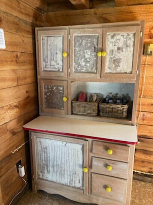 Pie safe in the cabin - you can see the walls of the cabin are truly wood and rustic. Pie safe in the cabin - you can see the walls of the cabin are truly wood and rustic.