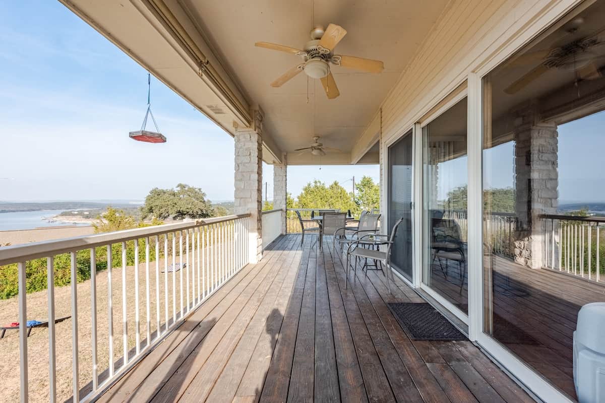 Covered outdoor living with dining, grilling, and unforgettable sunsets.