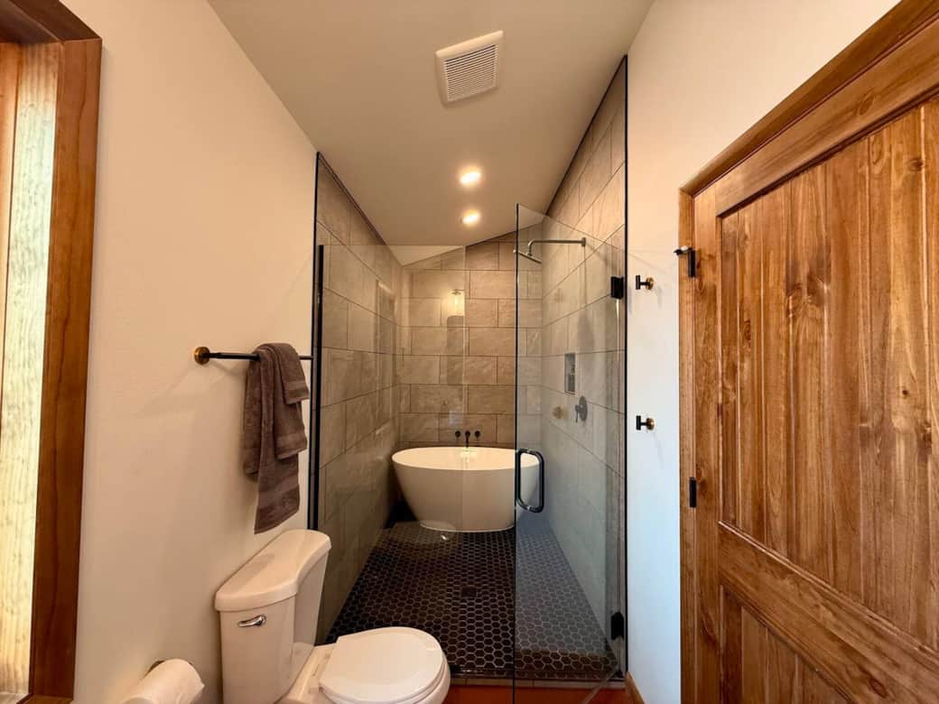 Soaking tub and rainfall shower