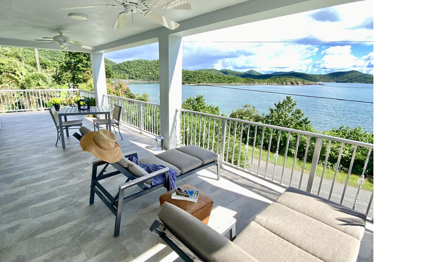 Large covered veranda for lounging and dining
