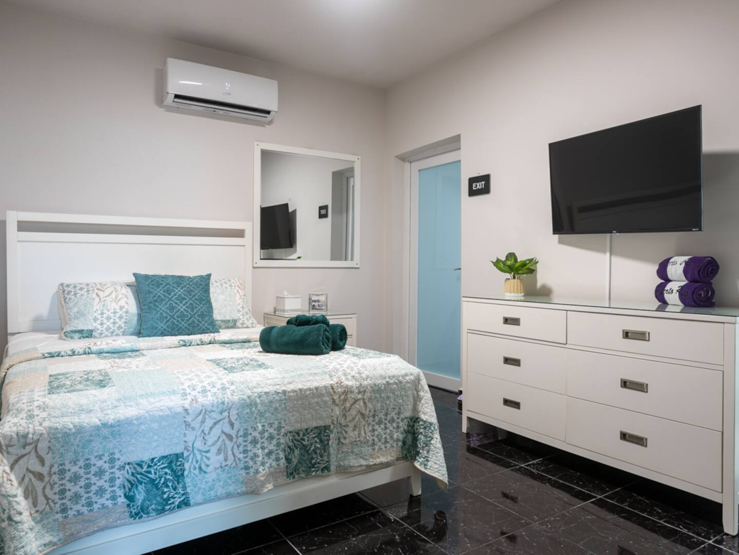 Bedroom 3: A cozy bedroom created for peaceful, uninterrupted sleep.