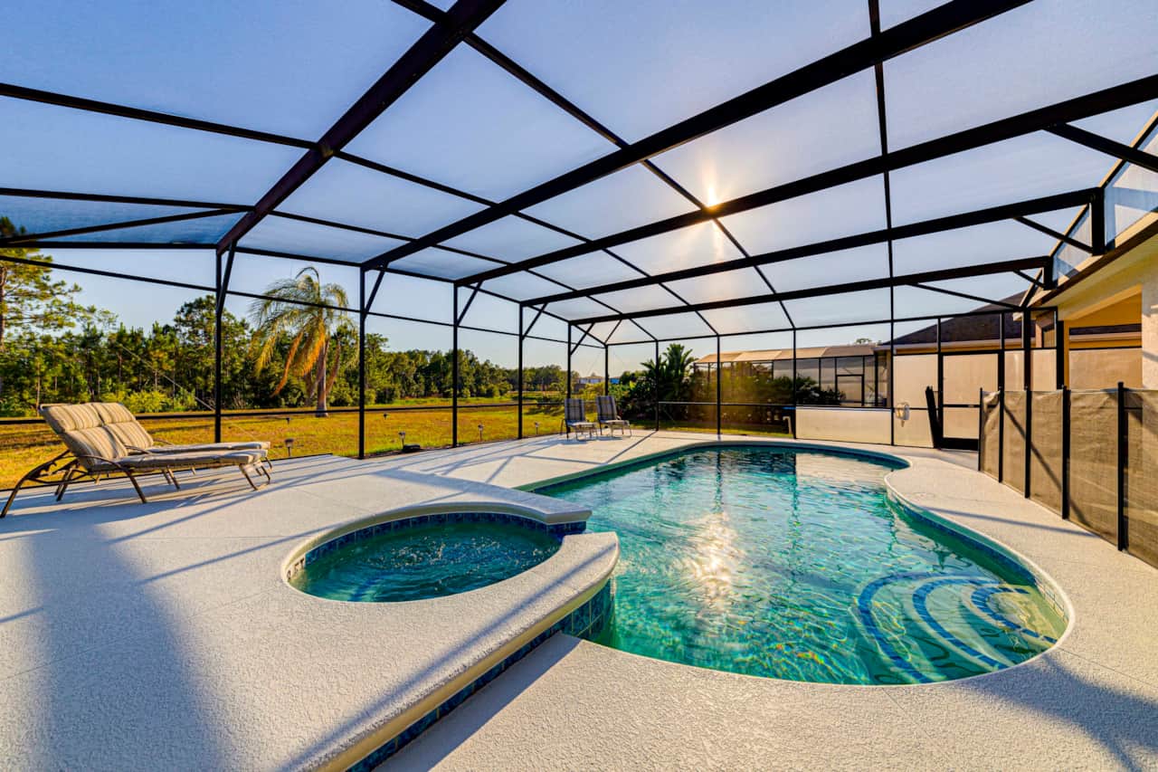 Large Pool and Spa with a Large Extended Decking Space Surrounding It