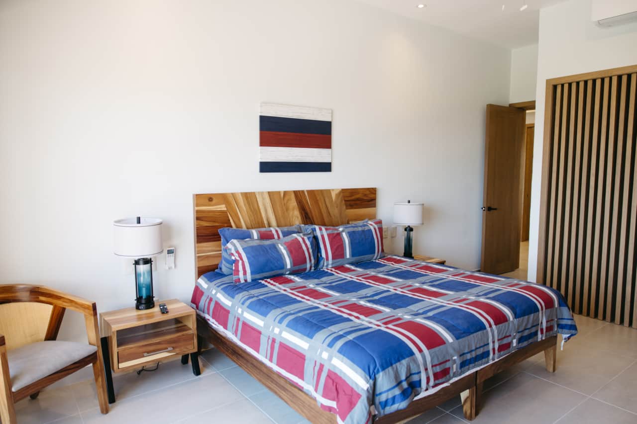 Cama king del dormitorio 1