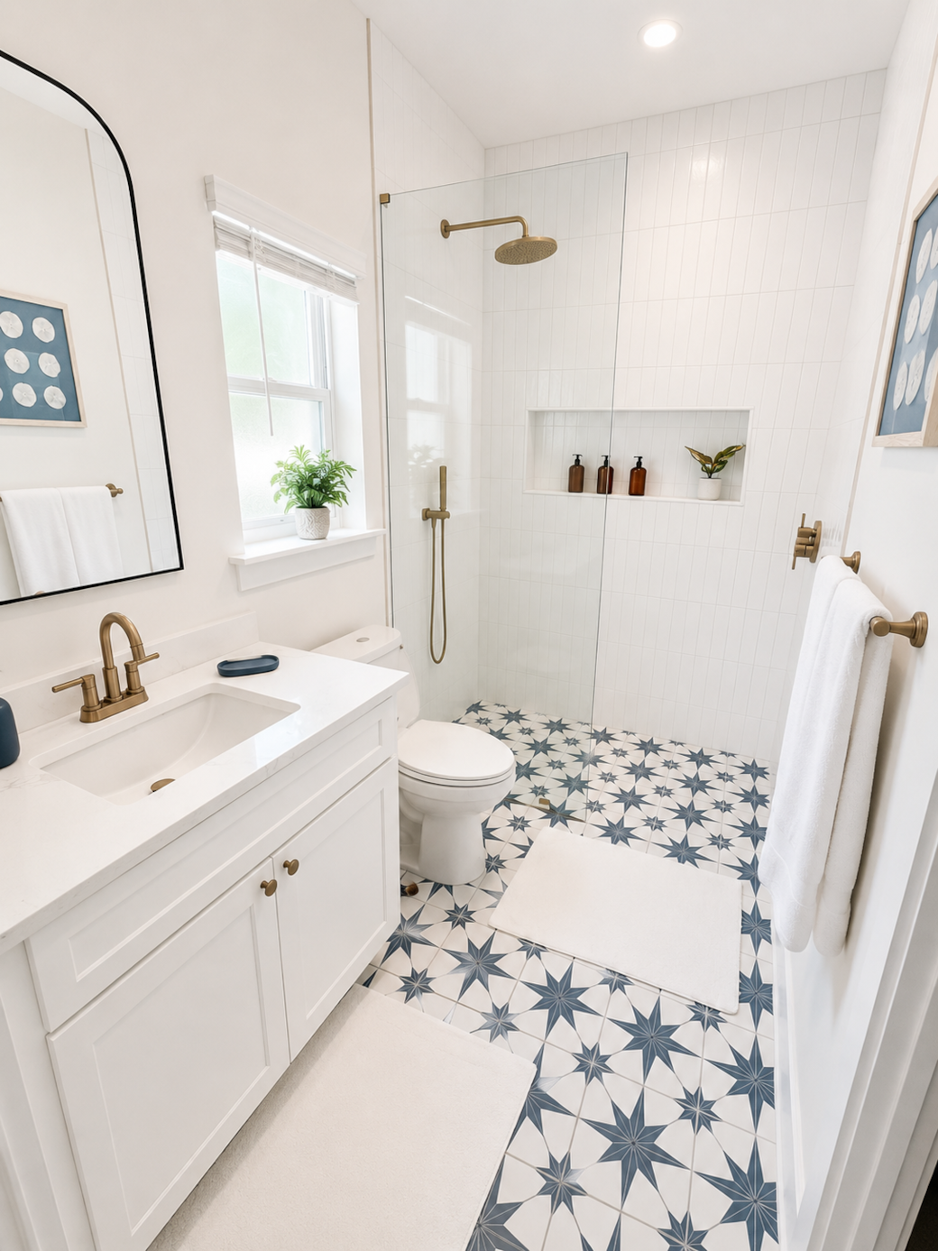 Master en-suite bathroom with walk in shower and luxury tiling.