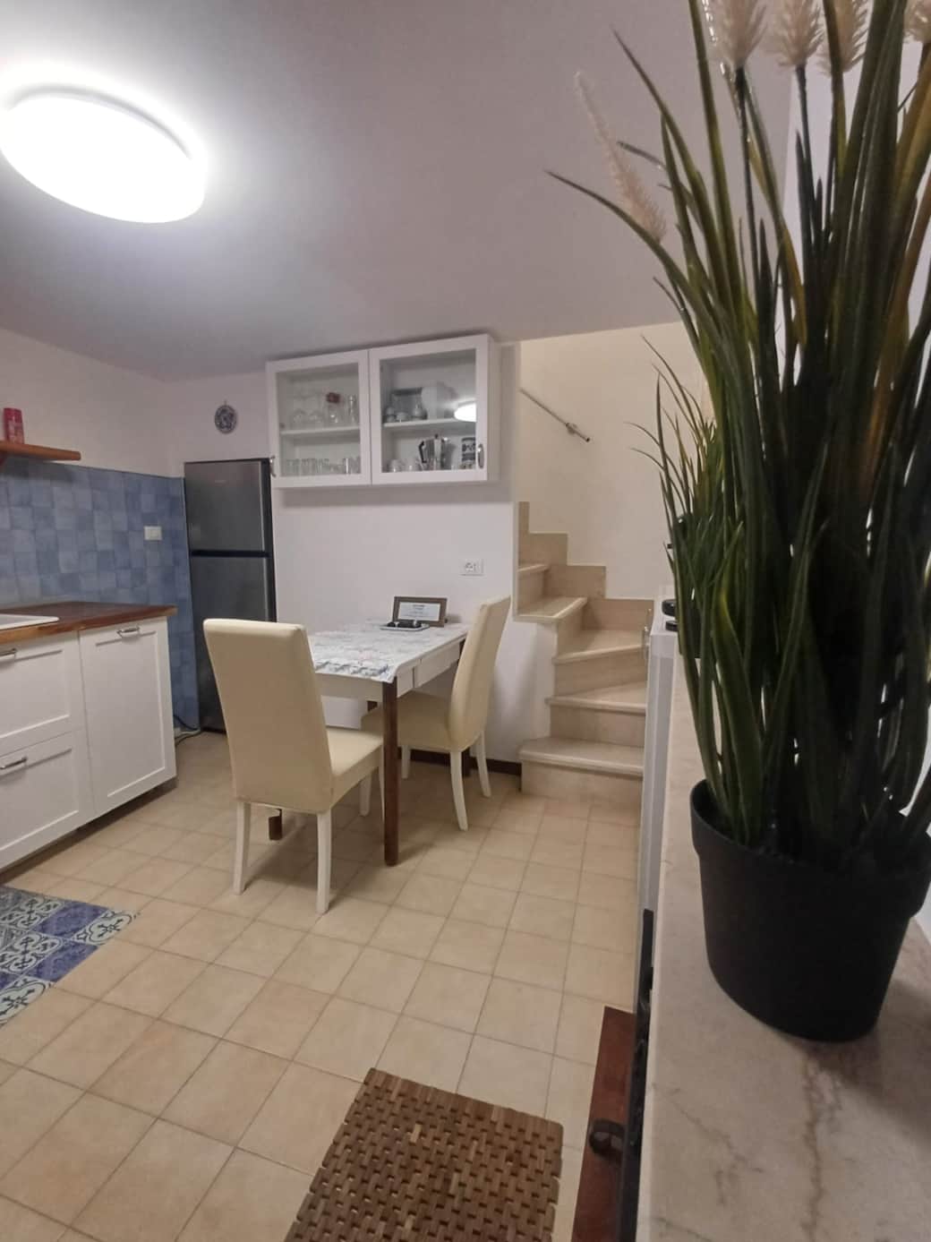 Kitchen with stairs to bedrooms