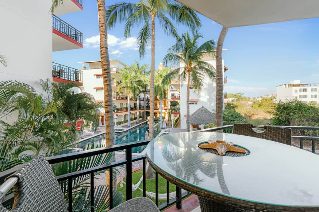 Private wrap around deck with pool and garden view.