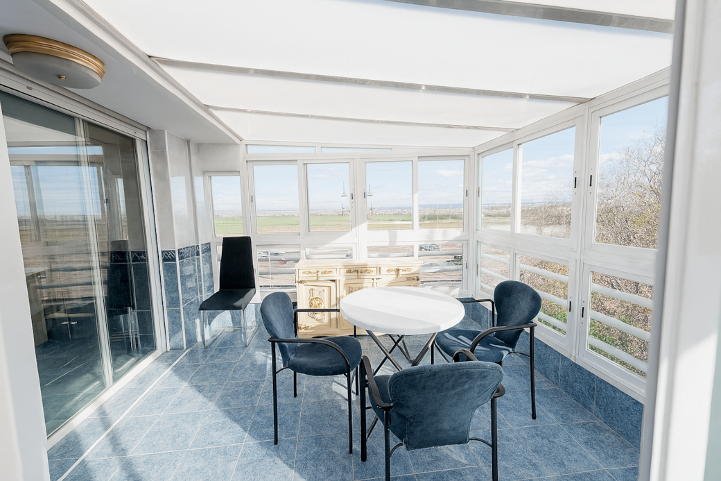 Private attic solarium, ideal for relaxing and enjoying the outdoors just for you.