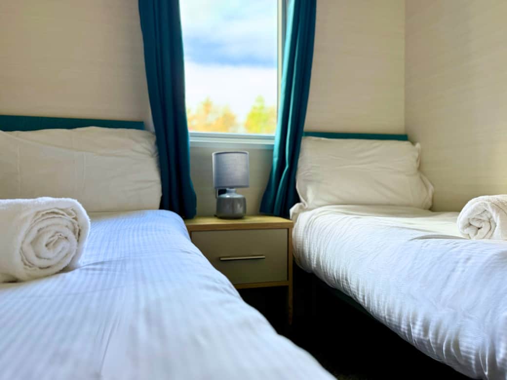 Second bedroom with two single beds