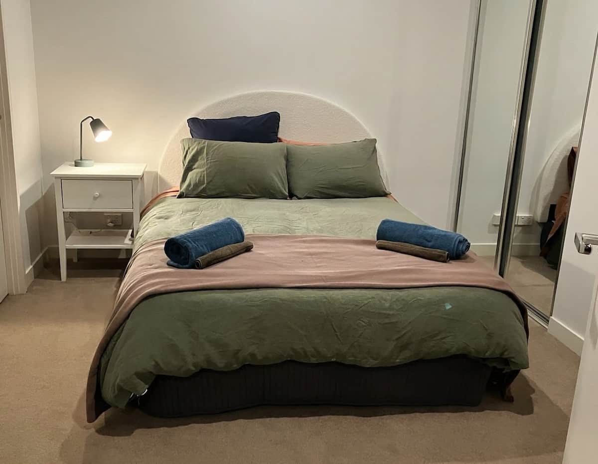Both bedrooms offer plenty of privacy, with your own private bathroom. This bedroom also has the added bonus of a laundry with a washing machine - perfect for longer stays.